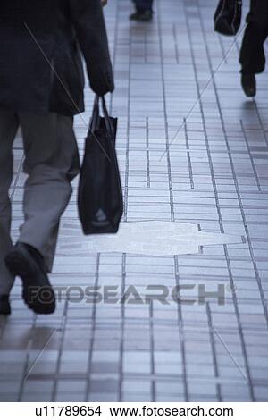 Picture - Businessman Walking. Fotosearch