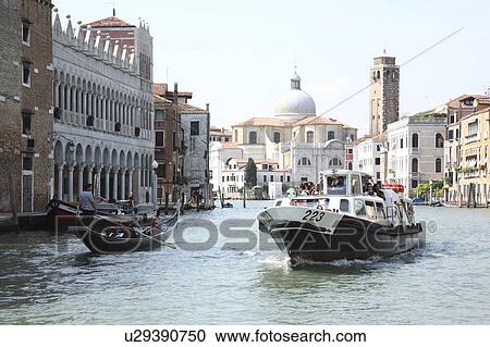 Stock Image - Canal and cityscape. Fotosearch