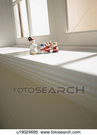 Christmas ornaments on window sill View Large Photo Image Stock Photography - Christmas ornaments on window sill. Fotosearch