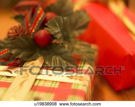 Stock Photo - Christmas presents, close up, soft focus. Fotosearch