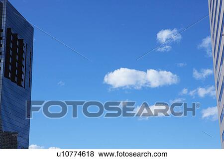Stock Photo - Clouds and office buildings. Fotosearch