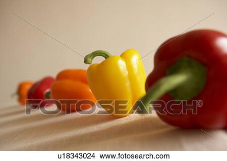 Picture - Colorful bell peppers, close up. Fotosearch