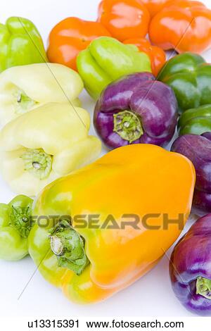 Colorful bell peppers, close up, white background View Large Photo Image Stock Image - Colorful bell peppers, close up, white background. Fotosearch