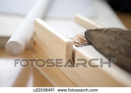 Stock Image - Dried bonito on grater, close up. Fotosearch