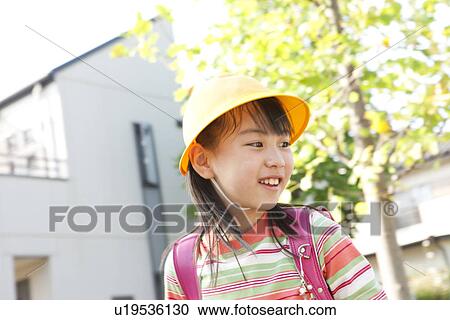 Girl looking away and smiling View Large Photo Image Stock Image - Girl looking away and smiling. Fotosearch