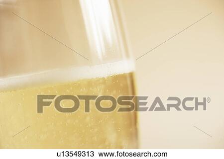 Glass of champagne, close up View Large Photo Image Stock Image - Glass of champagne, close up. Fotosearch