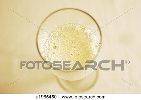 Glass of champagne, close up View Large Photo Image Stock Image - Glass of champagne, close up. Fotosearch