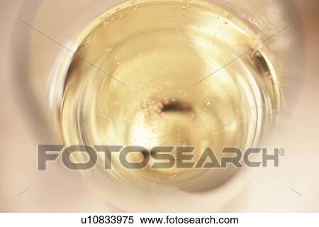 Stock Photography - Glass of champagne, close up. Fotosearch