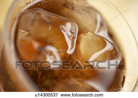 Stock Photo - Glass of iced tea, close up. Fotosearch