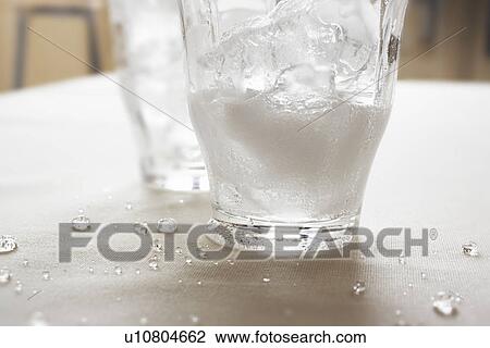 Glass of soda on table, close up View Large Photo Image Stock Image - Glass of soda on table, close up. Fotosearch