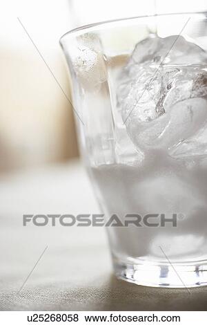 Stock Photo - Glass of soda on table, close up. Fotosearch