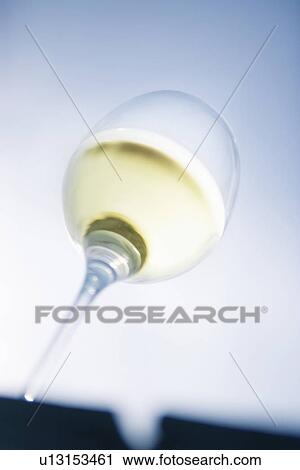 Glass of white wine, close up View Large Photo Image Stock Image - Glass of white wine, close up. Fotosearch
