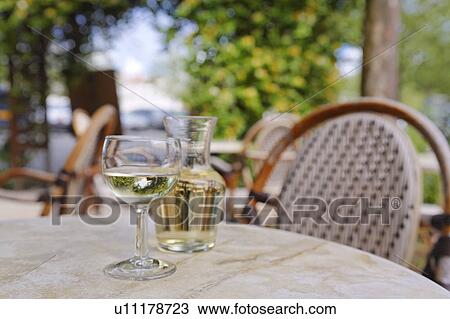 Glass of White Wine on Table, Charente Maritime, France View Large Photo Image Stock Image - Glass of White Wine on Table, Charente Maritime, France. Fotosearch
