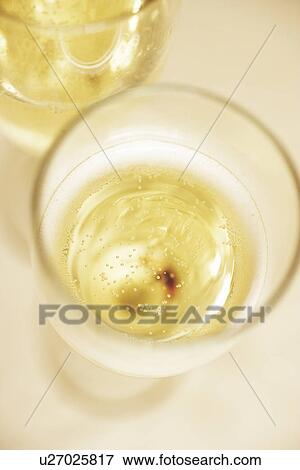 Stock Photo - Glasses of champagne, close up. Fotosearch