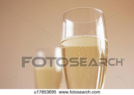 Glasses of champagne, close up, differential focus View Large Photo Image Stock Photography - Glasses of champagne, close up, differential focus. Fotosearch