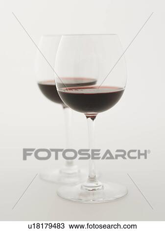 Glasses of red wine, white background View Large Photo Image Stock Image - Glasses of red wine, white background. Fotosearch