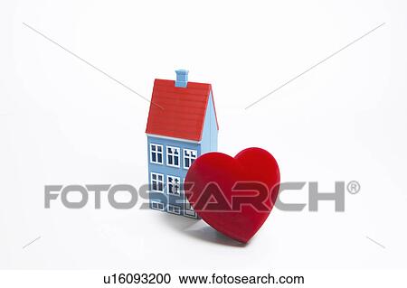 Stock Image - House and heart. Fotosearch