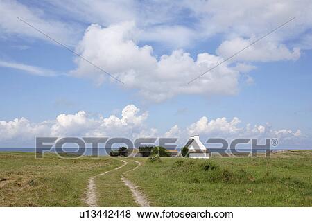Isolated House in Green Field, Sea Horizon in the Background, Finistere, Bretagne, France View Large Photo Image Stock Photo - Isolated House in Green Field, Sea Horizon in the Background, Finistere, Bretagne, France. Fotosearch