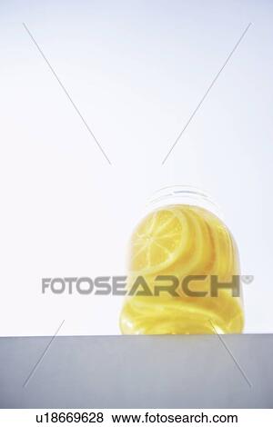 Jar of honey lemon preserve View Large Photo Image Stock Photo - Jar of honey lemon preserve. Fotosearch