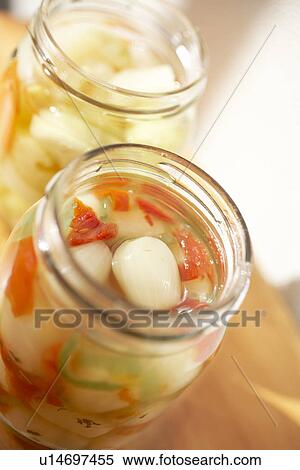 Jars of pickled vegetables, close up View Large Photo Image Stock Photography - Jars of pickled vegetables, close up. Fotosearch