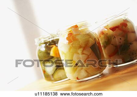Stock Photo - Jars of pickled vegetables. Fotosearch