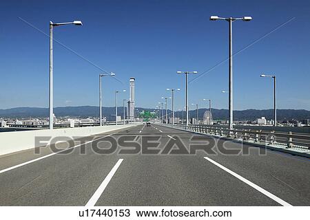 Stock Image - Kansai International airport access bridge. Fotosearch