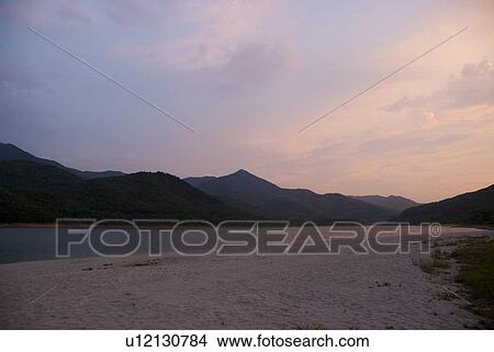 Lake in the evening View Large Photo Image Picture - Lake in the evening. Fotosearch