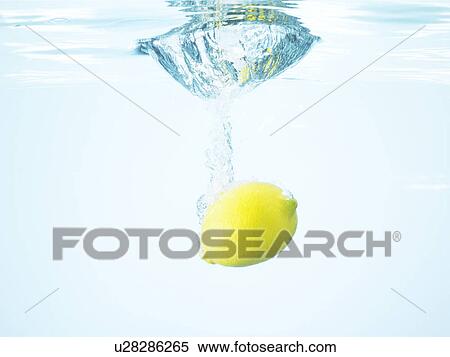Stock Photography - Lemons underwater. Fotosearch