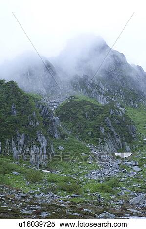 Stock Photography - Mountains in rain. Fotosearch