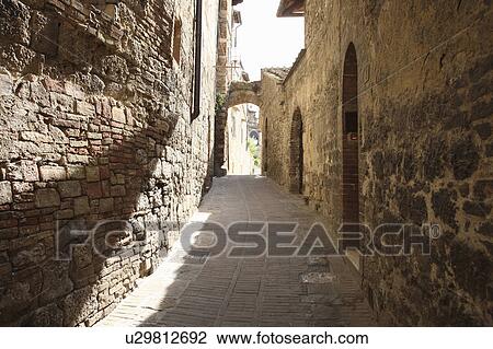 Narrow Alley, San Gimignano, Italy View Large Photo Image Stock Image - Narrow Alley, San Gimignano, Italy. Fotosearch