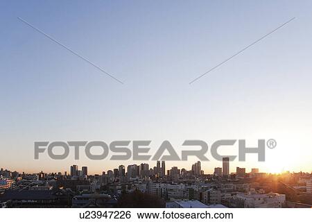 Stock Photograph - Office buildings in the morning. Fotosearch