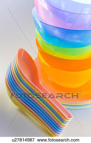 Piled colorful plastic bowls and spoons, close up, white background View Large Photo Image Stock Photo - Piled colorful plastic bowls and spoons, close up, white background. Fotosearch