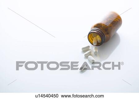 Pills and glass bottle View Large Photo Image Stock Image - Pills and glass bottle. Fotosearch