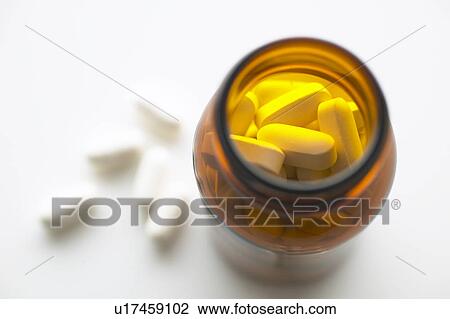 Pills and glass bottle View Large Photo Image Stock Image - Pills and glass bottle. Fotosearch