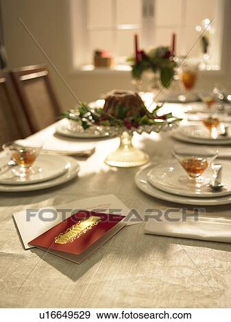 Place settings and Christmas cake View Large Photo Image Stock Photo - Place settings and Christmas cake. Fotosearch