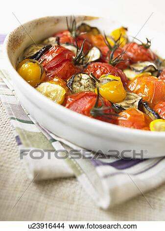 Plate of fried tomatoes, close up View Large Photo Image Picture - Plate of fried tomatoes, close up. Fotosearch