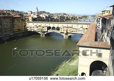 Stock Photograph - Ponte Vecchio and Arno River, Florence, Italy. Fotosearch