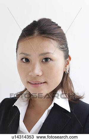 Stock Image - Portrait of businesswoman . Fotosearch