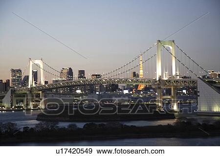 Stock Photo - Rainbow bridge at night. Fotosearch