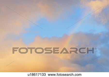 Rainbow in Sunset Sky, Hawaii, USA View Large Photo Image Stock Image - Rainbow in Sunset Sky, Hawaii, USA. Fotosearch