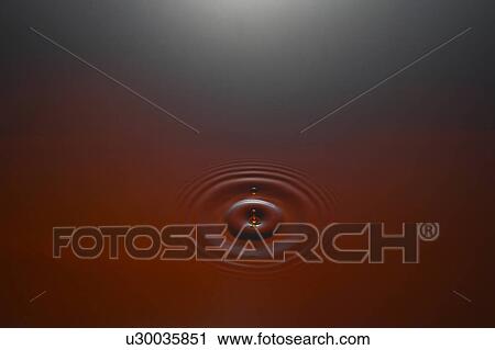 Stock Image - Ripple in red wine. Fotosearch