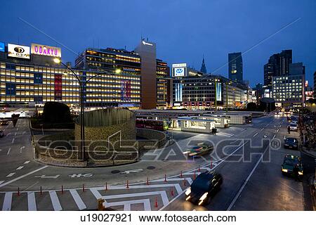 Shinjuku train station West exit at night View Large Photo Image Stock Image - Shinjuku train station West exit at night. Fotosearch