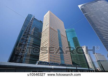 Stock Photo - Shiodome buildings and Yuri-kamome. Fotosearch
