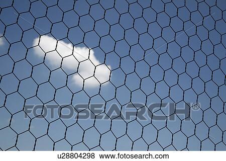 Stock Photo - Sky and fence. Fotosearch