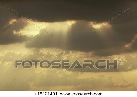 Stock Image - Sky and sunbeam. Fotosearch