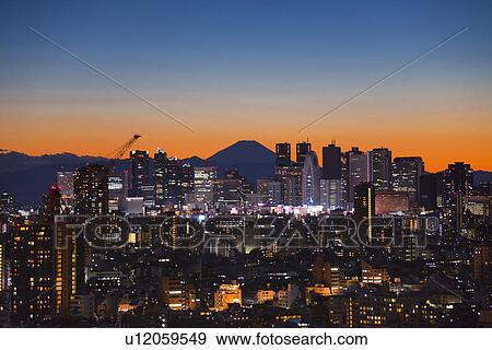 Skyline of Shinjuku and Mt. Fuji at dusk View Large Photo Image Stock Photo - Skyline of Shinjuku and Mt. Fuji at dusk. Fotosearch