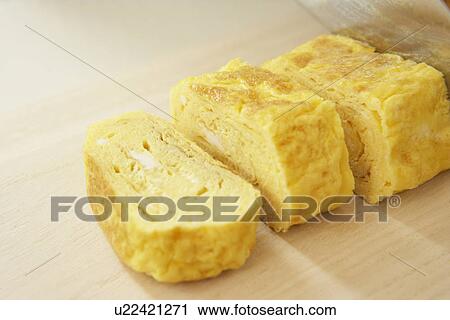 Slices of rolled egg, close up View Large Photo Image Stock Image - Slices of rolled egg, close up. Fotosearch