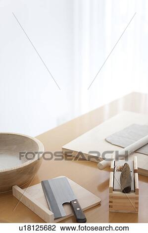 Stock Image - Soba dough and died bonito. Fotosearch