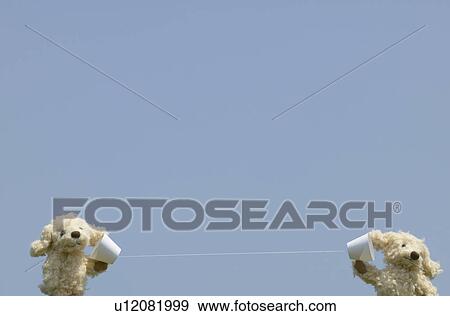 Stuffed Toys Listening to Tin Can Telephone View Large Photo Image Stock Photo - Stuffed Toys Listening to Tin Can Telephone. Fotosearch