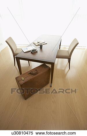 Suitcase in dining room View Large Photo Image Stock Photography - Suitcase in dining room. Fotosearch